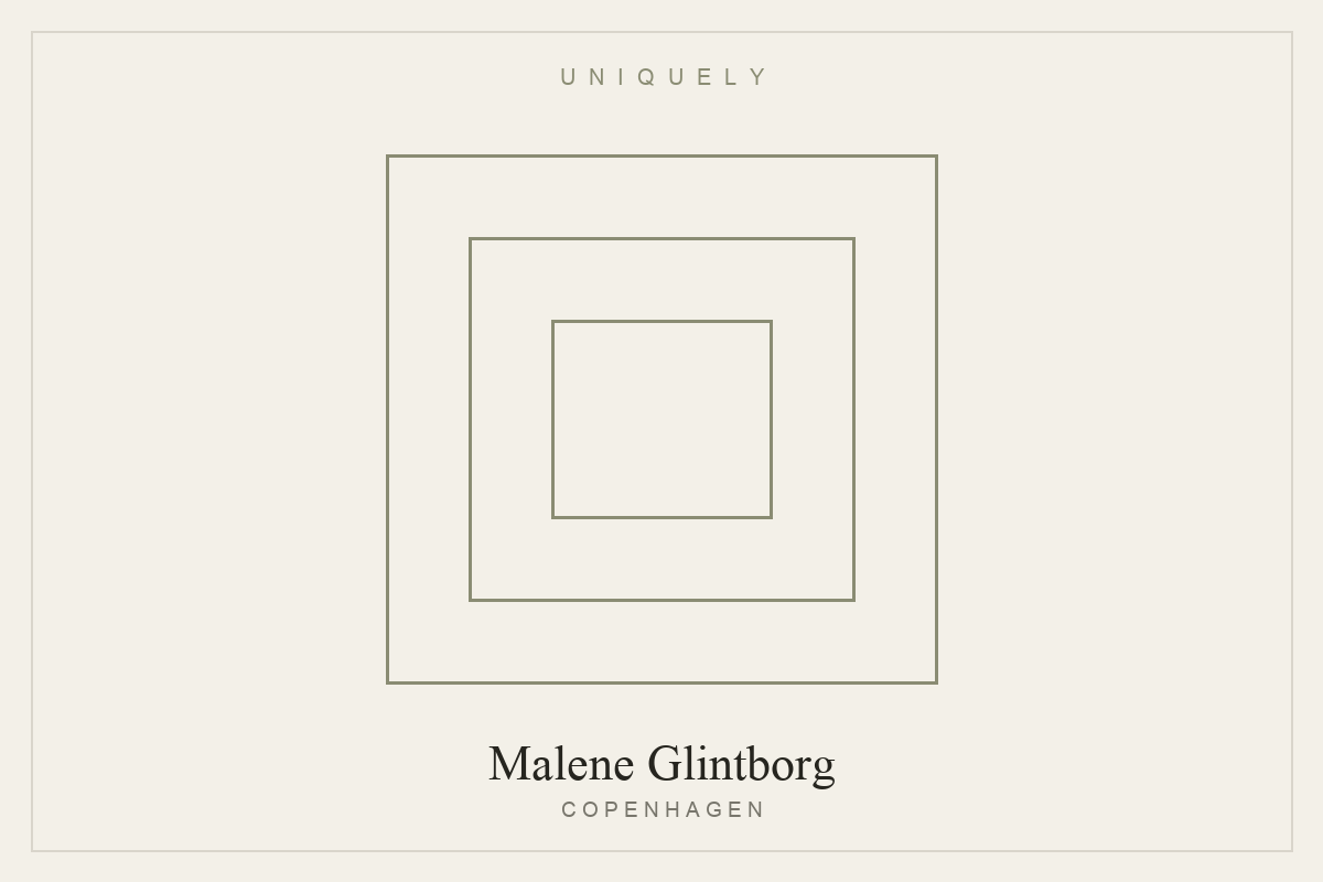A pair of minimal geometric earrings by Malene Glintborg